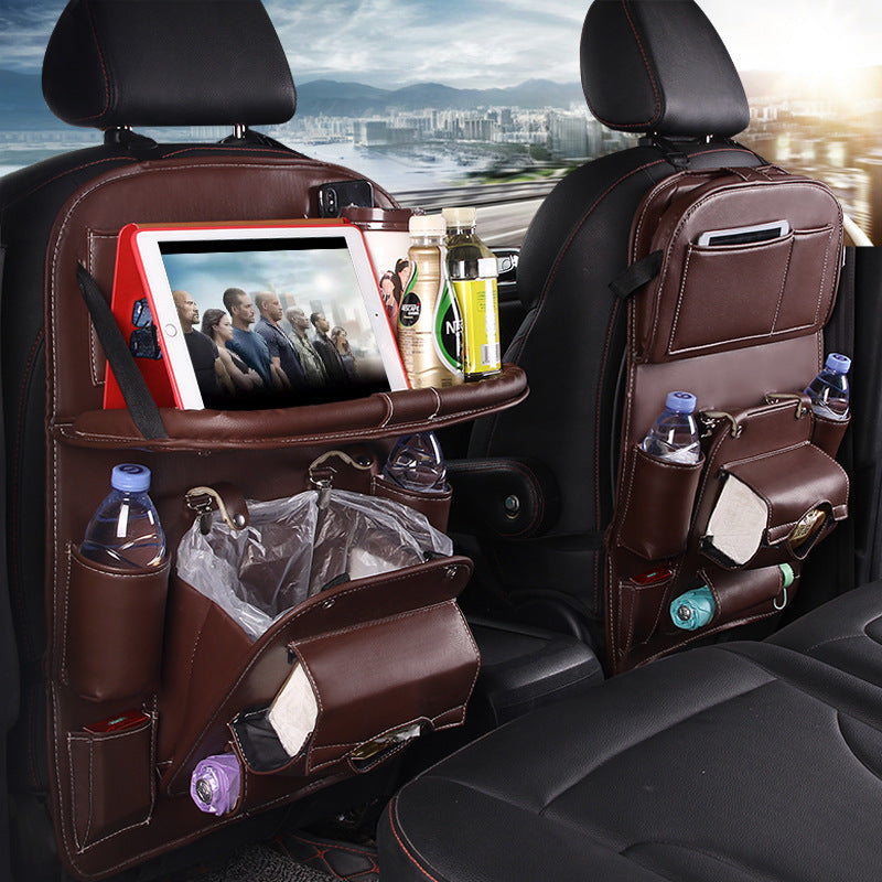cj brown leather Car Seat Organizer attached to car backseat with tablet holder and multiple storage pockets