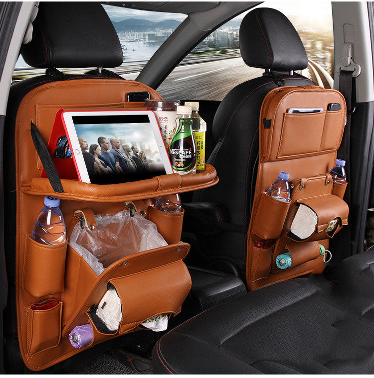 cj Car Seat Organizer in brown leather attached to car seat backs with storage for drinks tablets and tissues