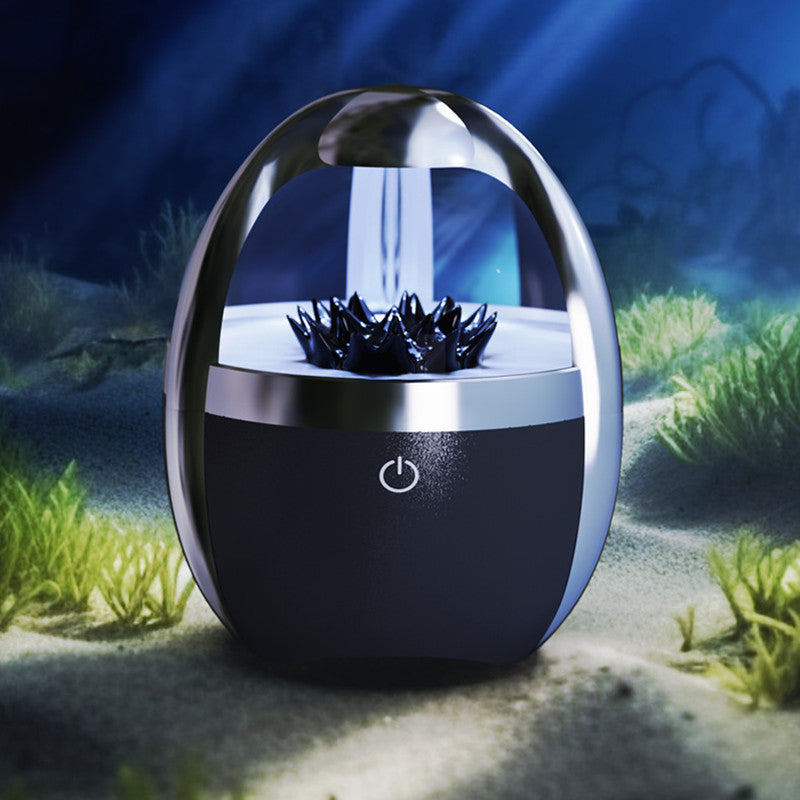 Fluid Bluetooth automotive accessory with sleek black and silver design and power button