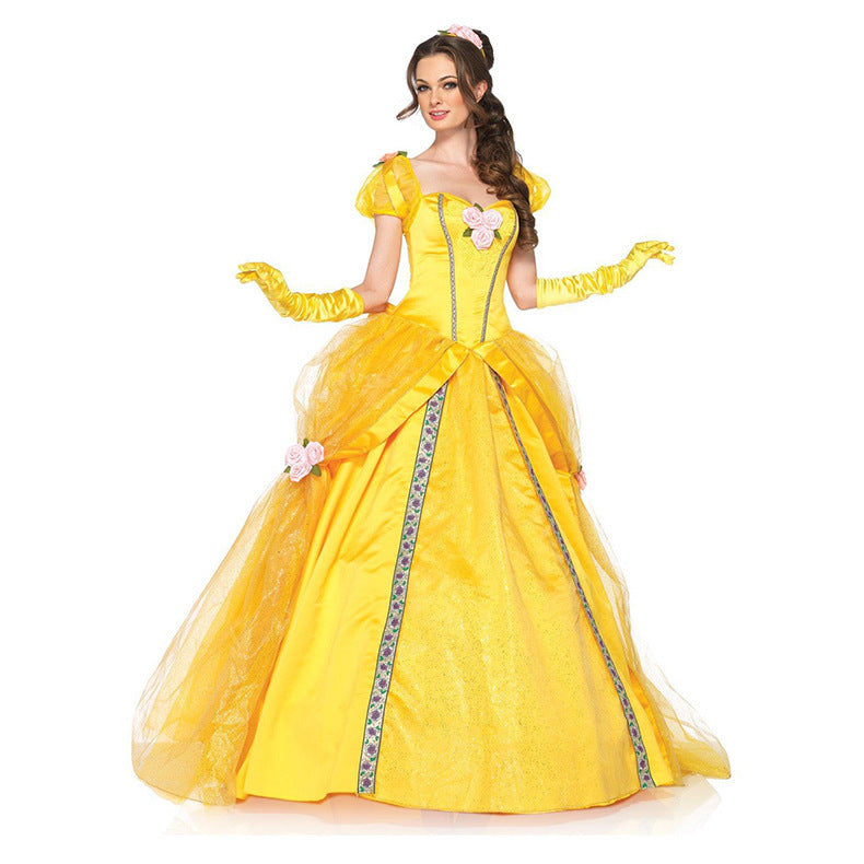 Yellow princess style ball gown with puff sleeves and floral accents worn by model